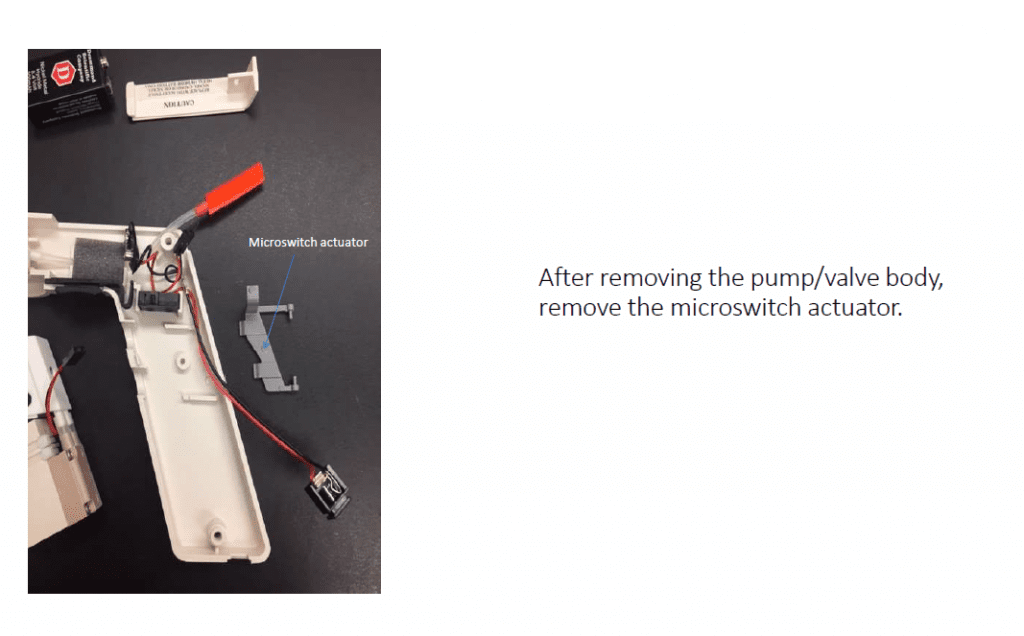 After removing the pump/valve body, remove the microswitch actuator