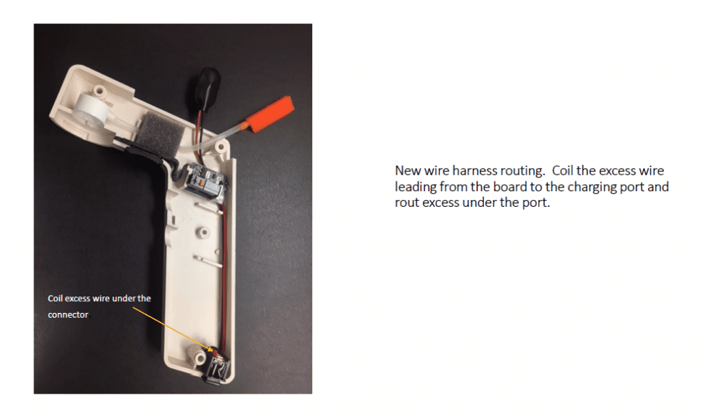 New wire harness routing. Coil the excess wire leading from the board to the charging port and route excess under the port.